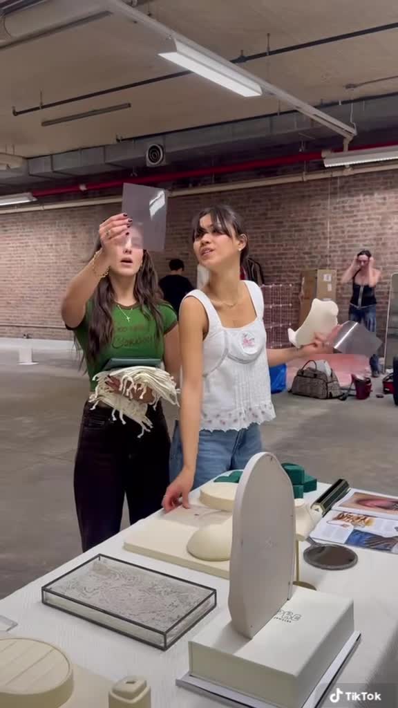 Jewelry and printed visual materials at the APRÈ NYFW pop-up