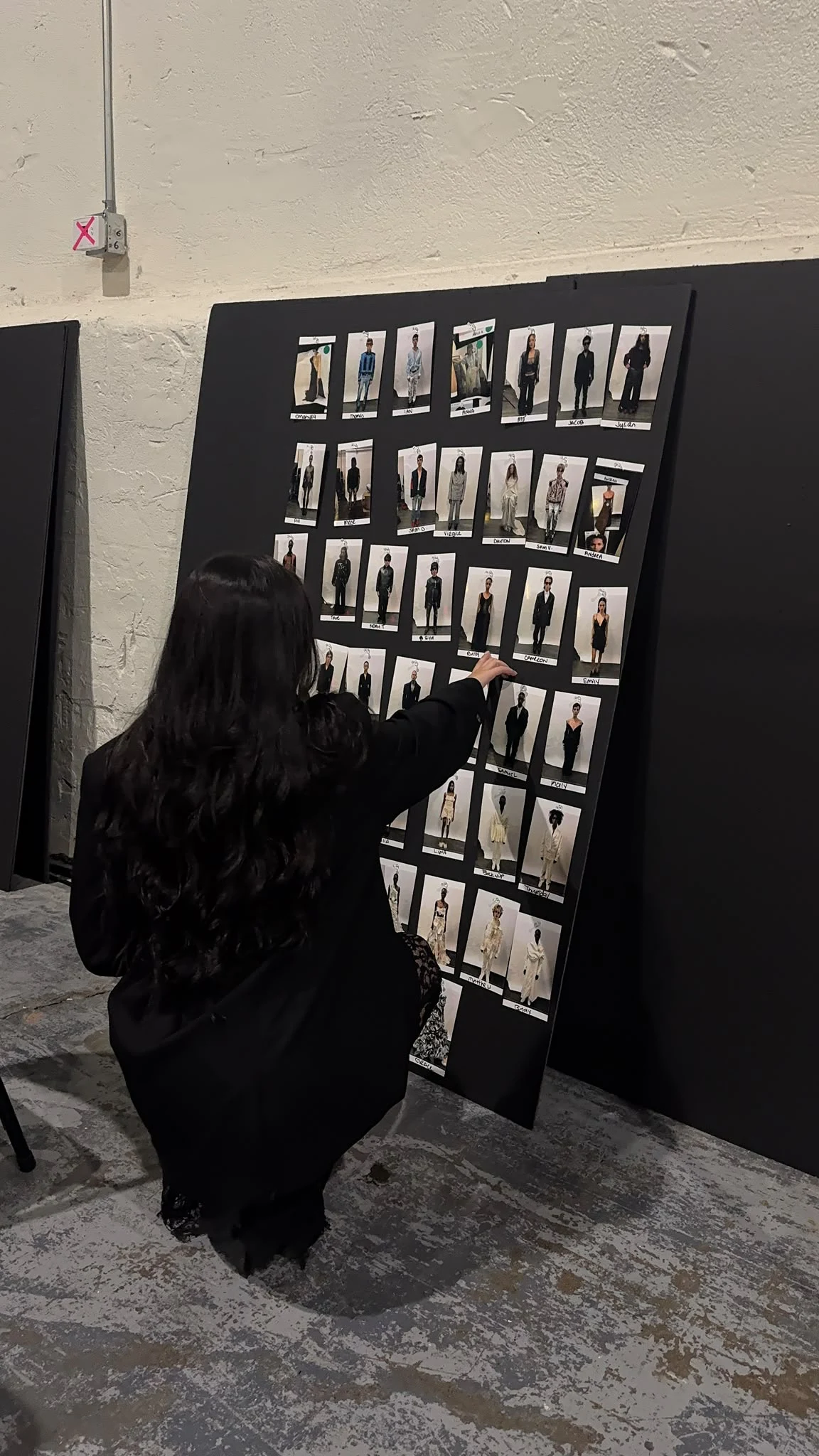 Backstage runway lineup board